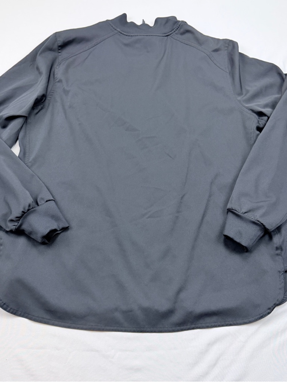 Ava Therese collection by Zavaté Apparel.
Women’s Black Zip-Front Scrub Jacket - Picture 2 of 11